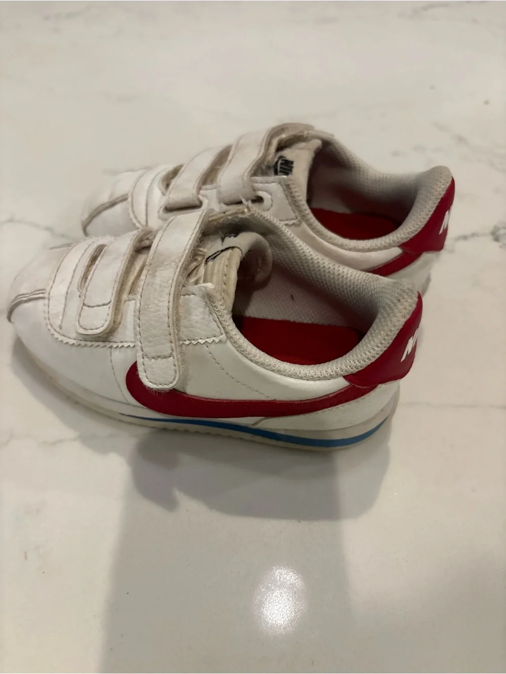 Nike Kids White Sneakers with Red Swoosh